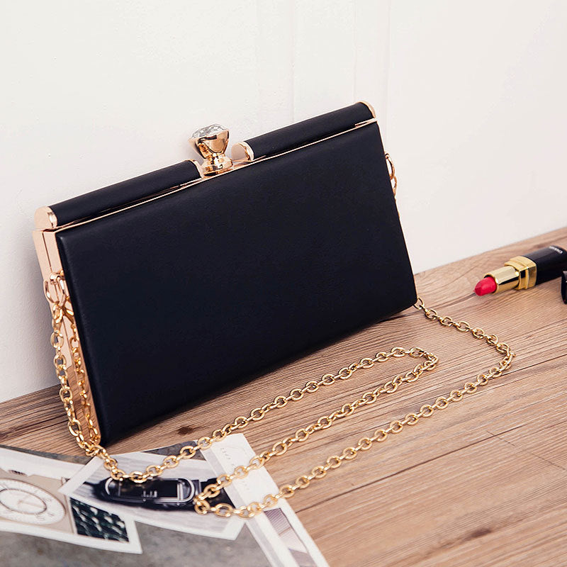 Adele Chain Handle Leather Clutch