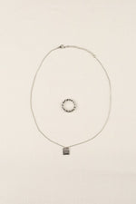 Load image into Gallery viewer, Rhea Silver Twisted Ring and Square Pendant Necklace Set
