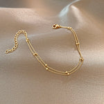 Load image into Gallery viewer, Double layered Gold Beaded Bracelet
