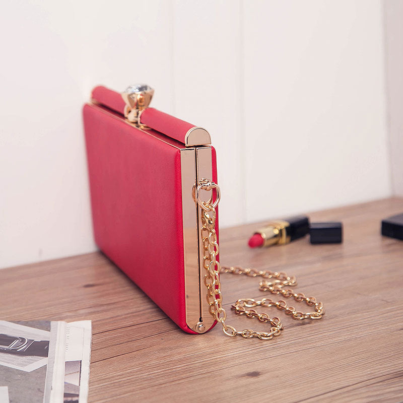 Adele Chain Handle Leather Clutch