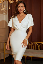 Load image into Gallery viewer, Beaded Dolman Sleeve Surplice Bodycon Dress
