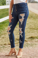 Load image into Gallery viewer, Nika Distressed Button Fly Raw Hem Jeans
